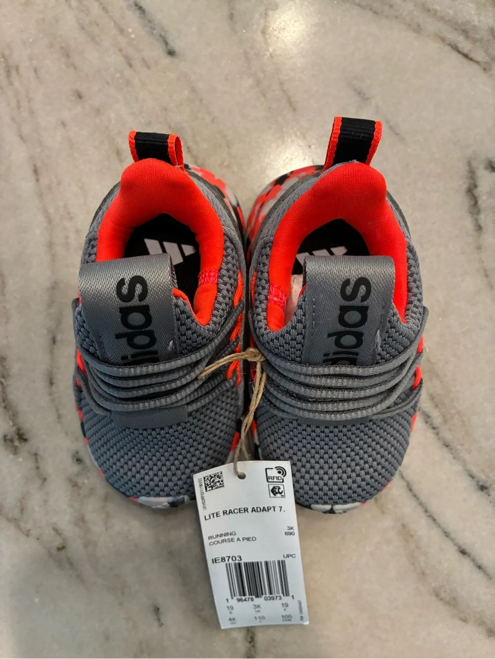 Child’s Adidas 4K Lite Racer Adapt 7.01